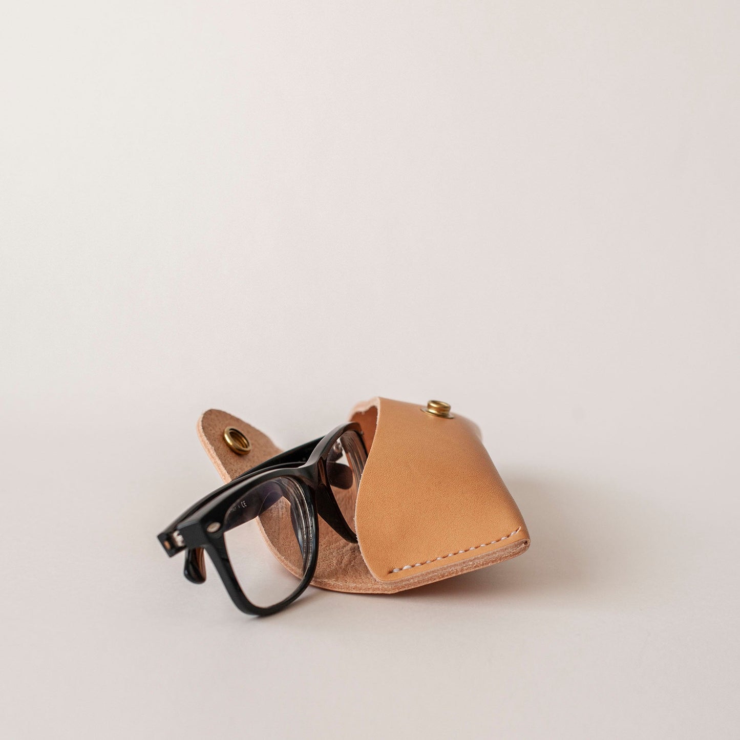 Optical Glasses in Nude Leather case with white stitching and brass stud button