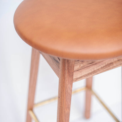 Olive Stool | Solid Wormy Chestnut, Brass Footrail, Tan Leather Seat (In Stock)